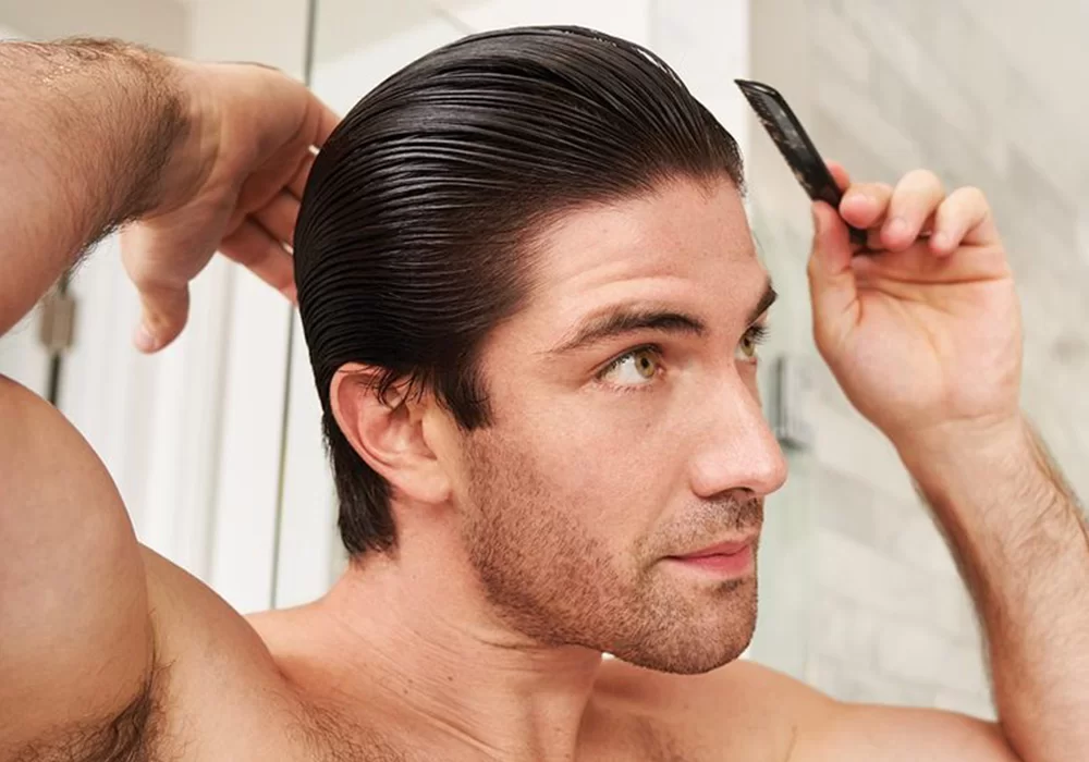 man combing his hair
